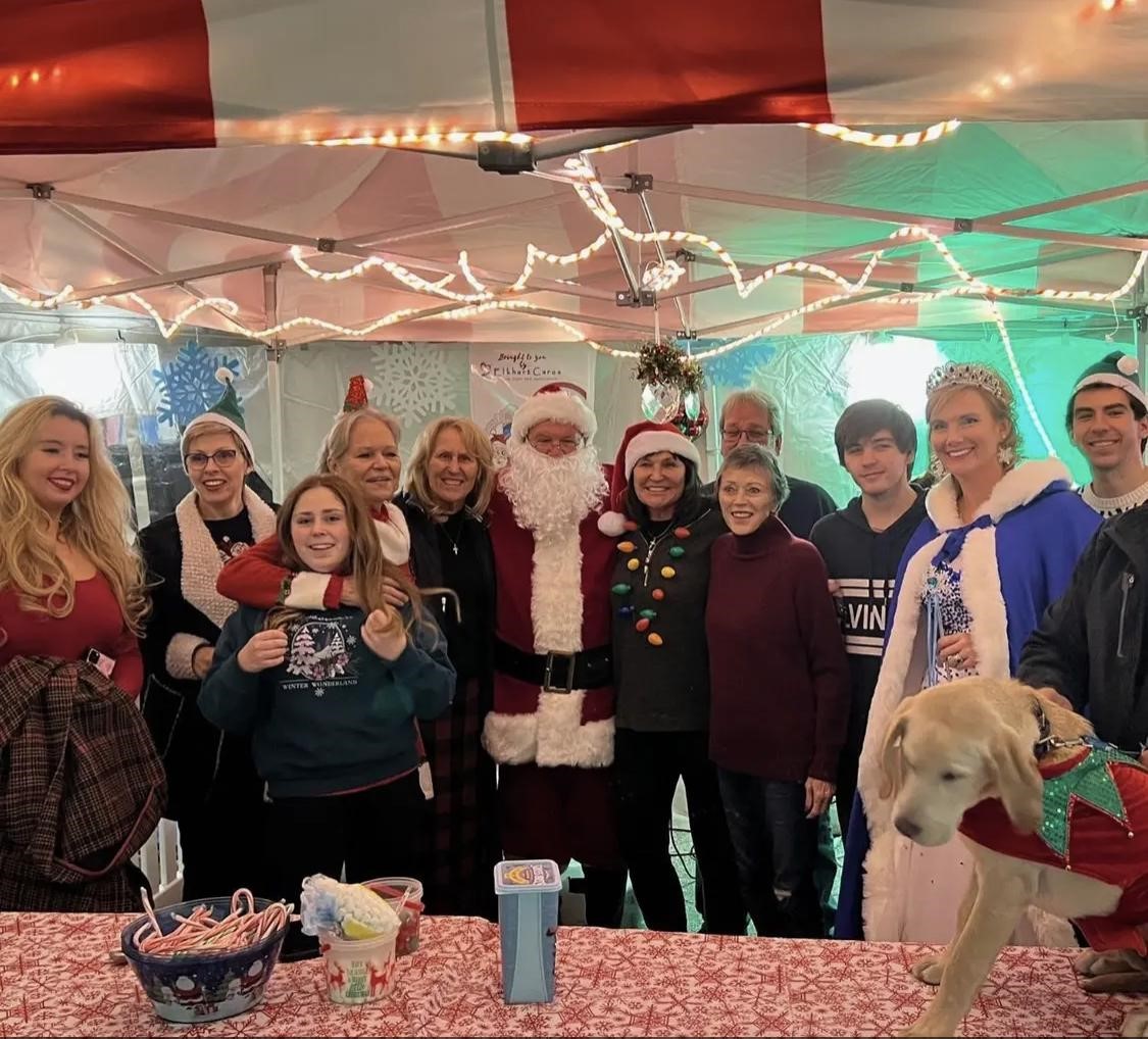 Deb Blain, late founder of ElkhartCares, with volunteers at Santa’s Village in 2022.